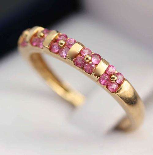 PINK SAPPHIRE ETERNITY GOLD ( 9ct ) RING.