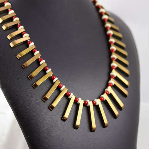 HANDCRAFTED BRONZE-COATED HEMATITE, CORAL AND OSTRICH SHELL NECKLACE. *JEWELLER EVALUATION R2`400*