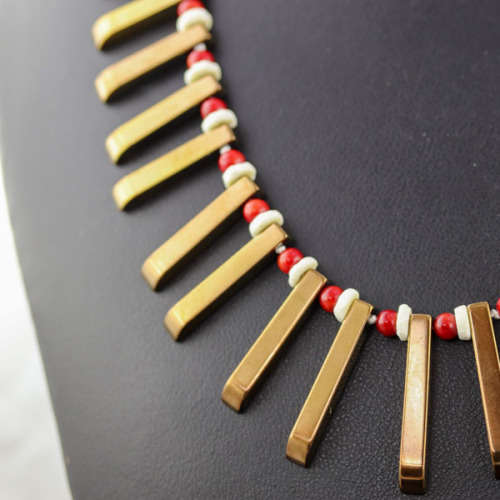 HANDCRAFTED BRONZE-COATED HEMATITE, CORAL AND OSTRICH SHELL NECKLACE. *JEWELLER EVALUATION R2`400*