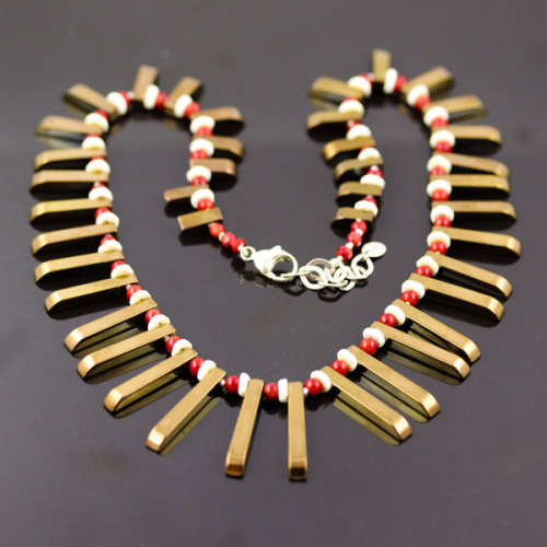 HANDCRAFTED BRONZE-COATED HEMATITE, CORAL AND OSTRICH SHELL NECKLACE. *JEWELLER EVALUATION R2`400*