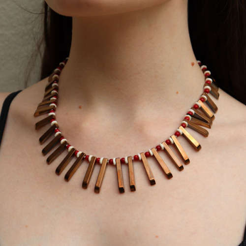 HANDCRAFTED BRONZE-COATED HEMATITE, CORAL AND OSTRICH SHELL NECKLACE. *JEWELLER EVALUATION R2`400*