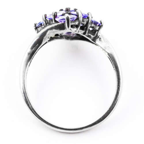 NATURAL TANZANITE STERLING SILVER CLUSTER RING. JEWELLER EVALUATION CERT R6`500