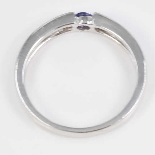 CONTEMPORARY DESIGN TANZANITE SOLITAIRE 9CT WHITE GOLD RING. 375. ENGLISH HALLMARKS