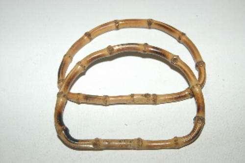 A pair of bag handles -- bamboo
