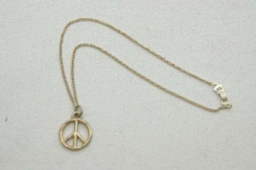 Golden 'Peace' pendant and chain