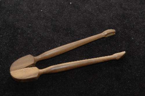 Olivewood tongs for getting olives out of the bottle!