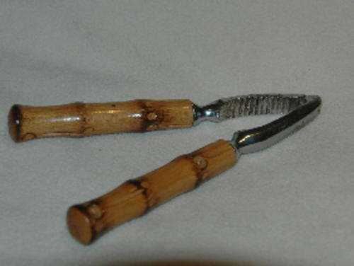 Nut cracker with bamboo handles