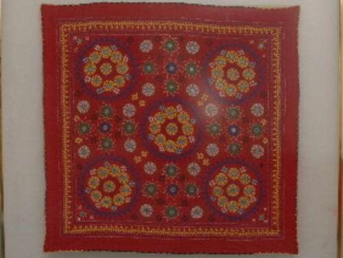 Colourful eastern embroidery 880mm sq. One 'mirror' missing, otherwise gd cond.