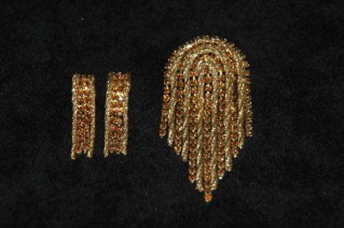 Stunning cascade brooch and clipon earrings. Excellent quality, safety clip.