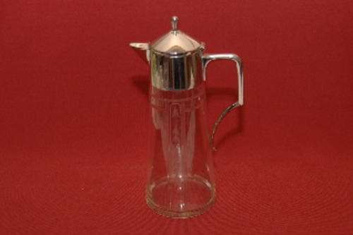 A fine claret jug, silver plated collar and cover.  Excellent.