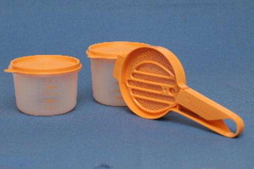 Sift from one container to another. Unused Tupperware.