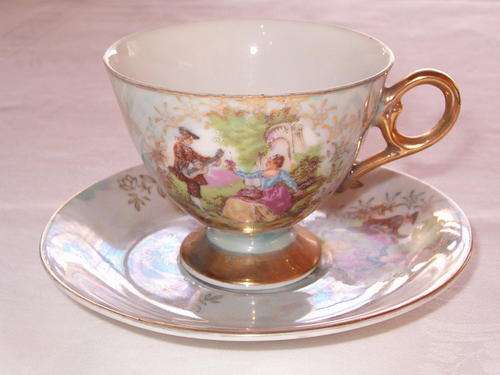 Fine Porcelain Tea Cups with Romantic Scene