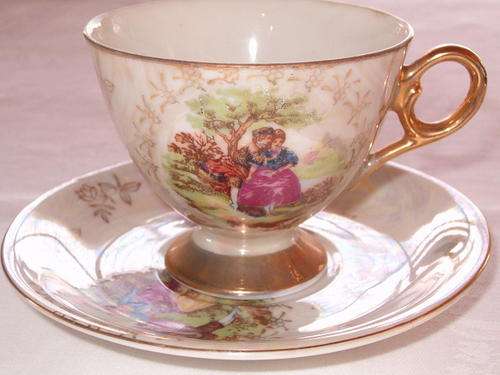 Fine Porcelain Tea Cups with Romantic Scene