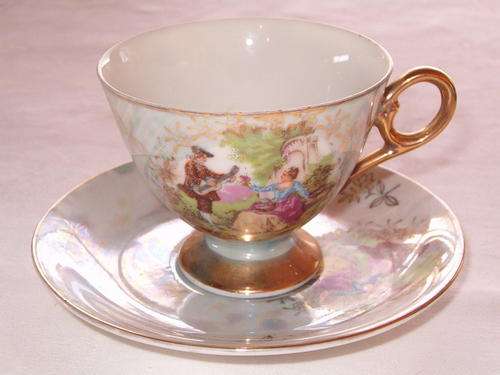 Fine Porcelain Tea Cups with Romantic Scene