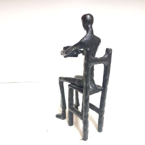 IRON SCULPTURE  - ART - MAN SITTING AND READING