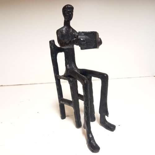 IRON SCULPTURE  - ART - MAN SITTING AND READING