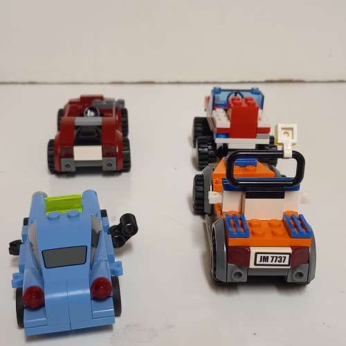 LEGO VEHICLES AND FIVE LEGO MINIFIGURES WITH EXTRA