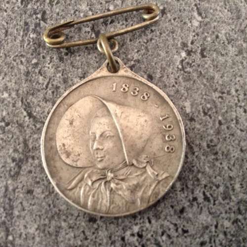 SILVER MEDAL CELEBRATING 100 YEARS OF VOORTREKKER MEN AND WOMEN . 1838----1938.