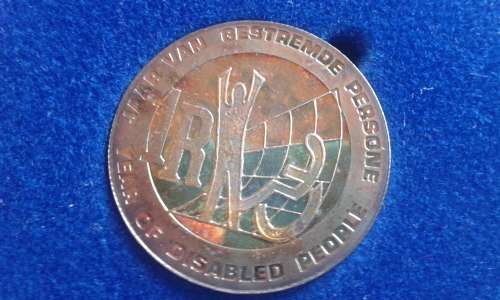 1986 PROTEA SILVER RAND.YEAR OF THE DISABLED.BRILLIANT PROOF BLUE BOX. MINTAGE 5150..