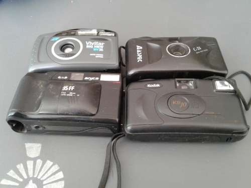 4 Vintage Cameras. Aspec c24.Kodakkb 10.Aryca.Vivitar.Untested.3 Pouches.Bid 1 taking 4.