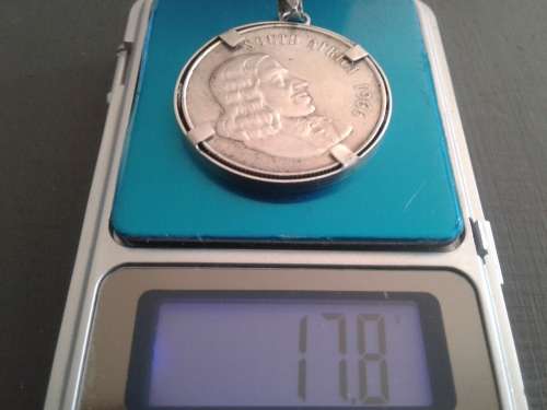 RARE SILVER 1966 RSA ENG. RAND 1 COIN WITH SILVER PENDANT ATTACHMENTS.FINE SILVER 14.5 GRAMS.