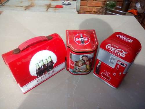 3 Authentic Coca Cola tins.
