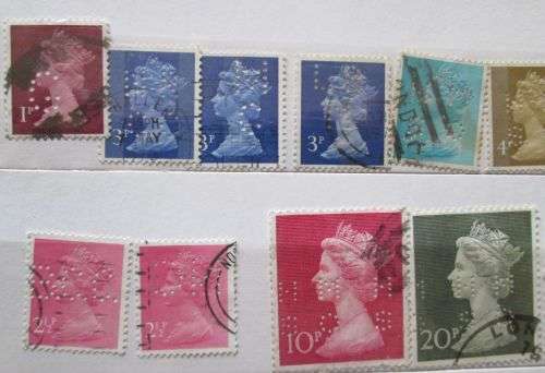 Great Britain Queen Elizabeth 1967 - 1977 Lot of 23 Stamps with Perfins