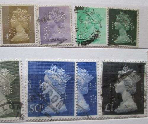 Great Britain Queen Elizabeth 1967 - 1977 Lot of 23 Stamps with Perfins