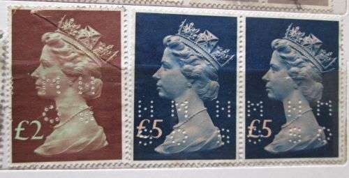Great Britain Queen Elizabeth 1967 - 1977 Lot of 23 Stamps with Perfins
