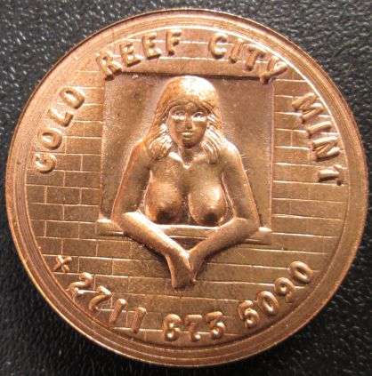 Gold Reef City mint: Head / Tails medallion