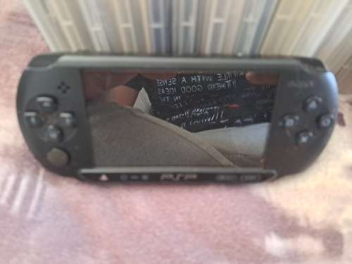 2x PSP,CHARGER AND 22 GAMES ALL FOR ONE BID