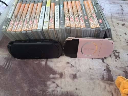 2x PSP,CHARGER AND 22 GAMES ALL FOR ONE BID