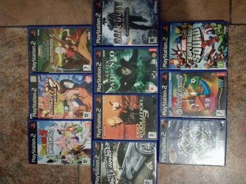 PS2 with 2 controllers, 4 buzzers, 11 games
