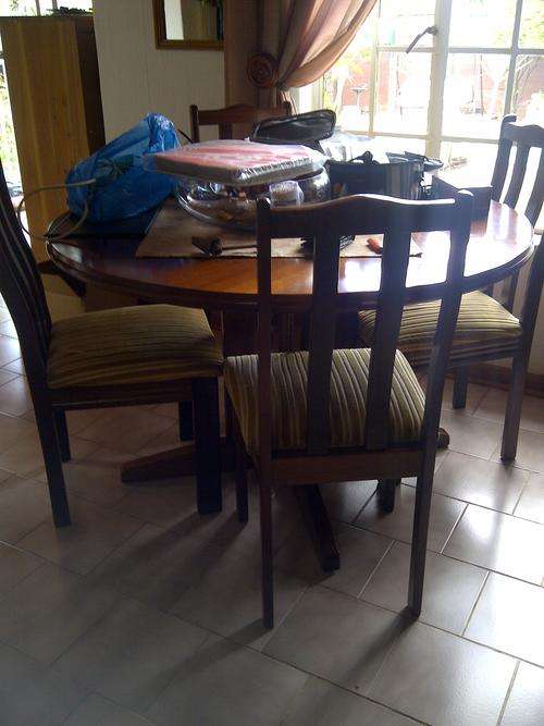 Dining room table and 4 chairs, teak and pine.
