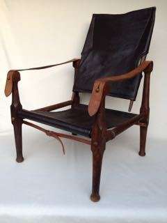 BEAUTIFUL CAMPAIGN CHAIR IN GREAT CONDITION - UPHOLSTERED IN DARK BROWN LEATHER