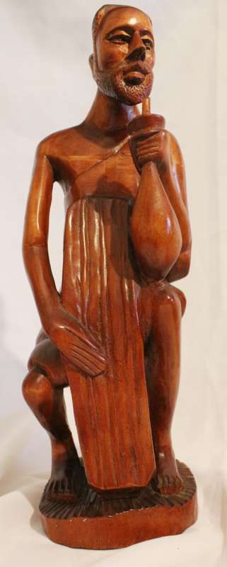 Drinking man 2 wood sculpture