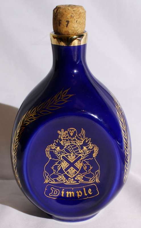 Empty blue ceramic Dimple whisky bottle FOR TOM