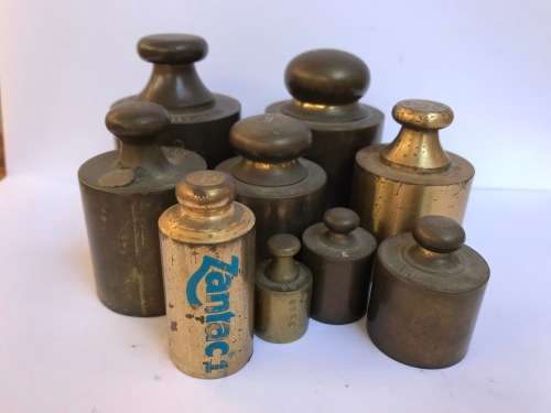 Antique brass weights