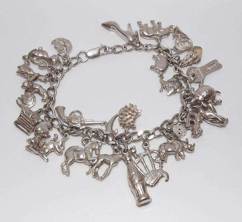 Stunning & HEAVY sterling silver charm bracelet with MANY charms !!!!