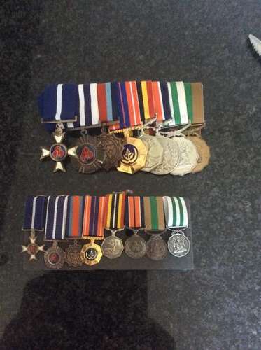 Group of medals with Pro merito Decoration and miniatures