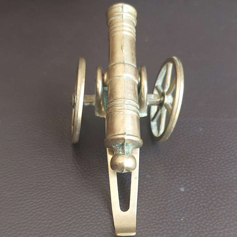 Small beautifully made brass plated cannon with wheels and rammer