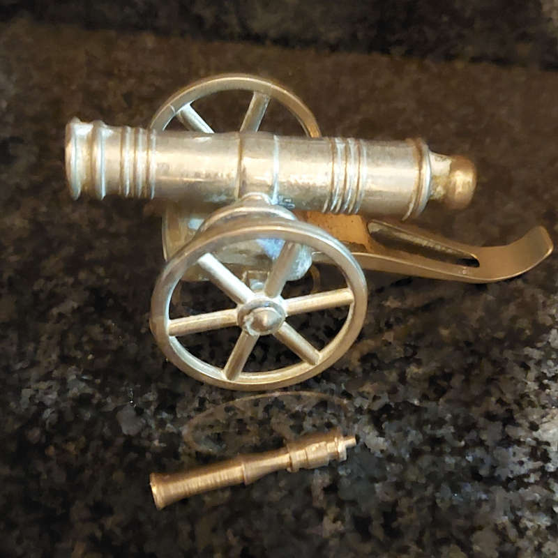 Small beautifully made brass plated cannon with wheels and rammer