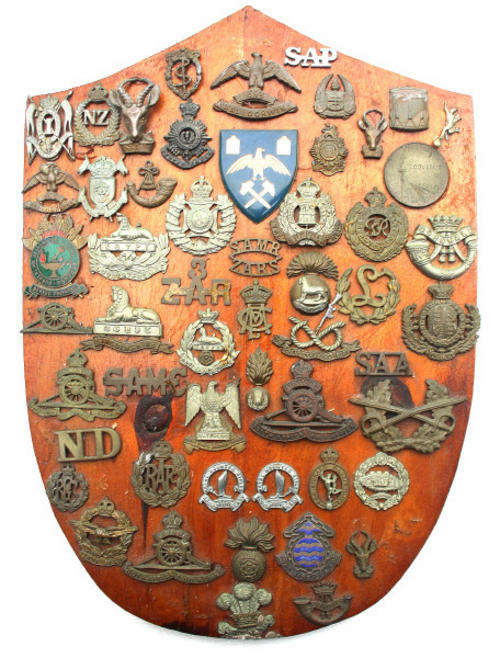 Board of Assorted Badges incl:(Victorian Crowns & Royal Flying Corps )