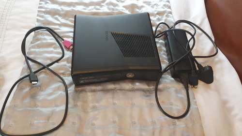 Xbox 360 Console, 2 Controllers, 3 Games( Grand Theft Auto V, FIFA 19, Assassin's Creed III).