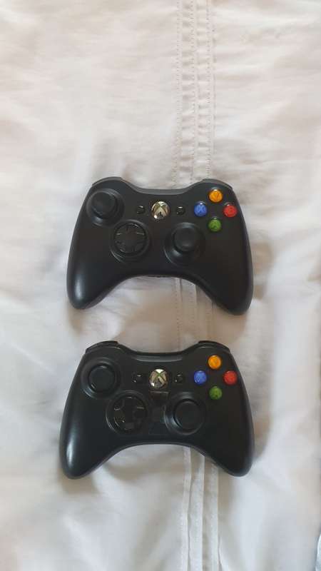 Xbox 360 Console, 2 Controllers, 3 Games( Grand Theft Auto V, FIFA 19, Assassin's Creed III).