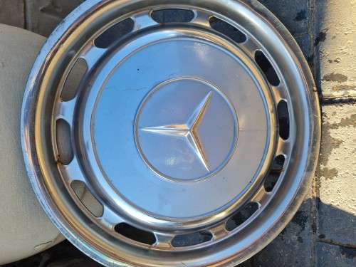Vintage -Mercedes Hub-Caps and beauty rings