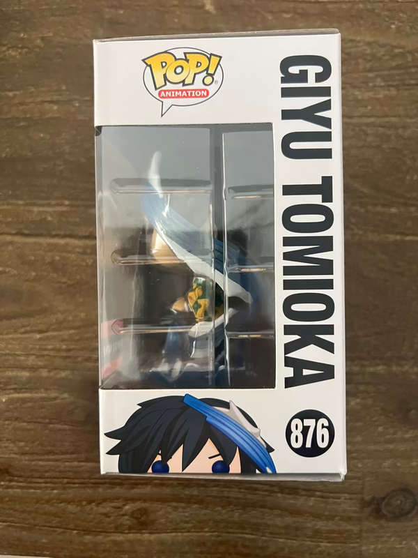 GIYU TOMIOKA!! DEMON SLAYER!! FUNKO POP!! AAA EXCLUSIVE!!