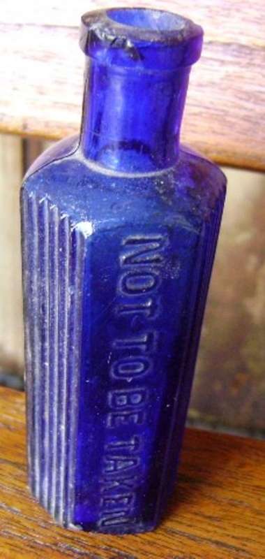 SMALL CHEMIST'S COBALT BLUE NOT TO BE TAKEN BOTTLE