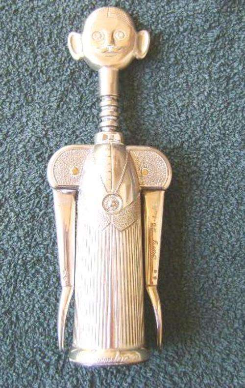 VINTAGE SILVER PLATED BOTTLE OPENER