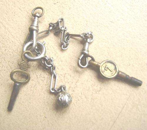 ANTIQUE POCKET WATCH CHAIN AND SIZE 6 AND 7 KEYS